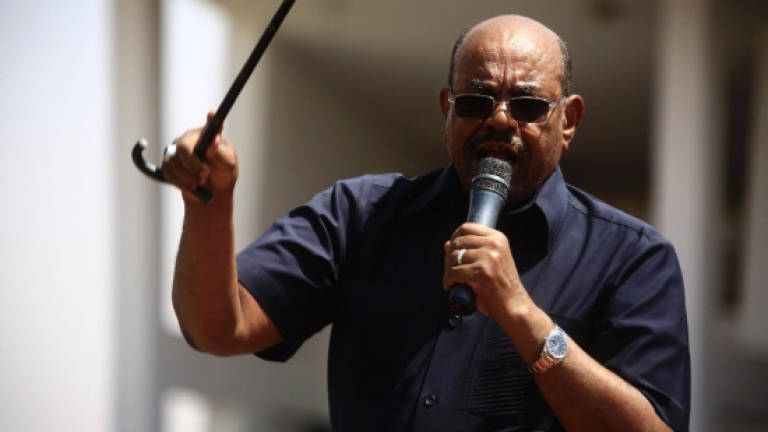 Sudan's Bashir vows to crush opposition protests
