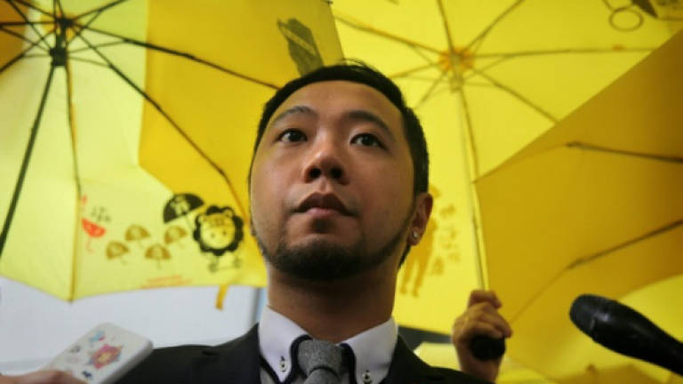 Hong Kong democracy protester given five weeks for police assault