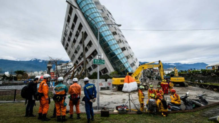 Taiwan rescue workers pull more bodies from quake rubble
