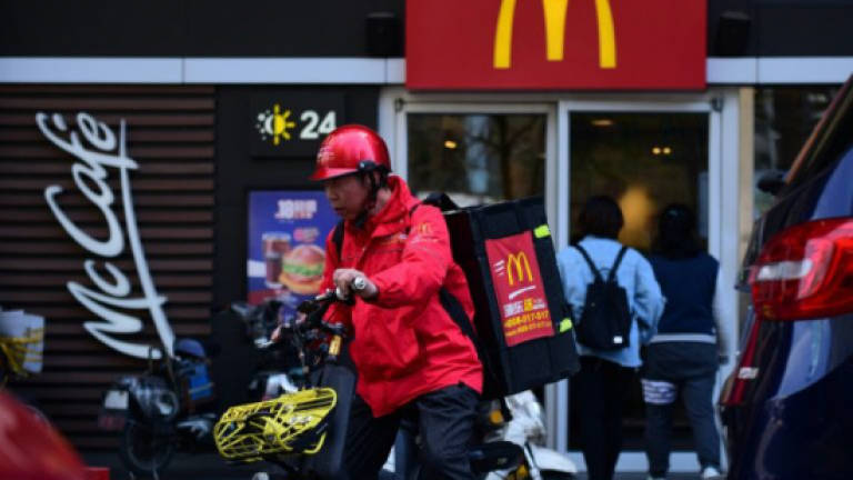 Chinese urged to boycott US firms, but Big Mac fans unconvinced