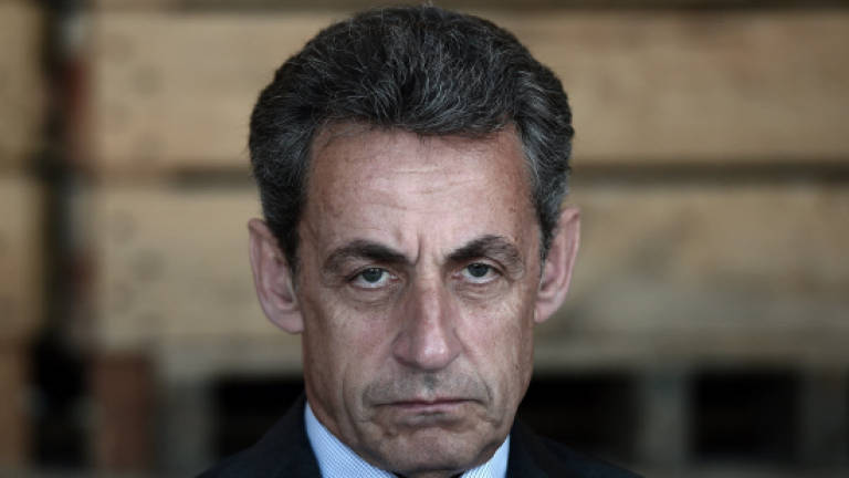 French ex-president Sarkozy held in Libya financing probe (Updated)