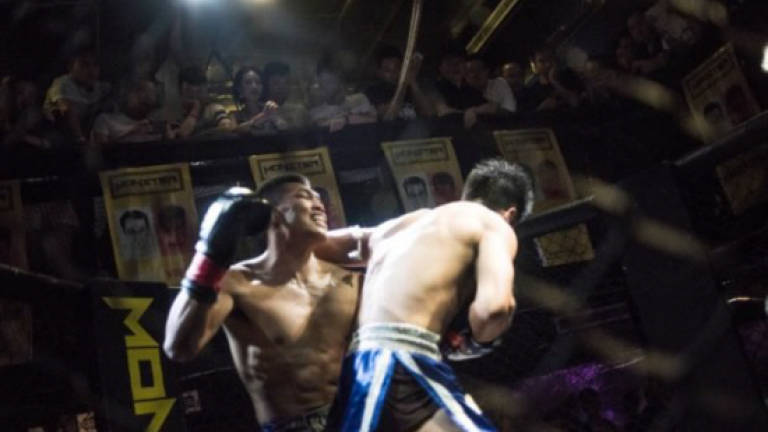 Bloodied at Chinese fight club for RM300