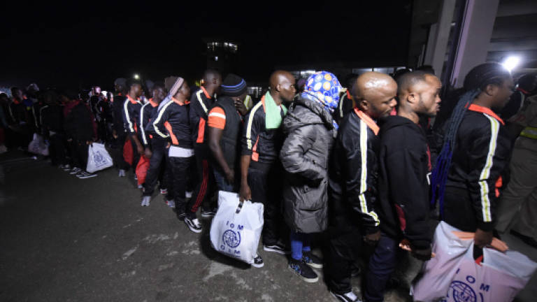 Returning Nigerians express relief after 'hell' of Libya camps