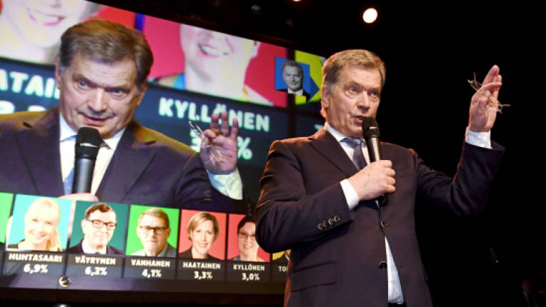 Finland re-elects pragmatic president Niinisto to ease Russia worries