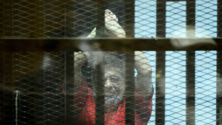 Egypt's Morsi sentenced to life in espionage trial