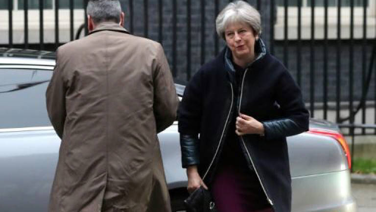 May shakes up government in crunch year for Brexit