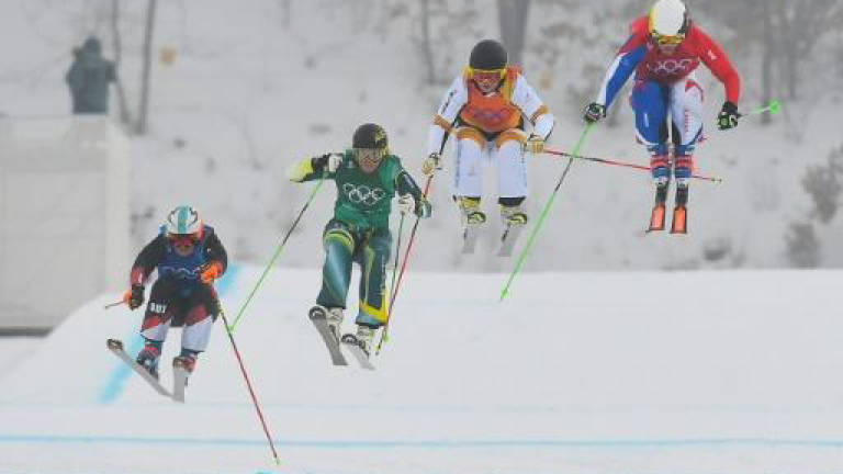 Olympic ski cross serves up thills, danger