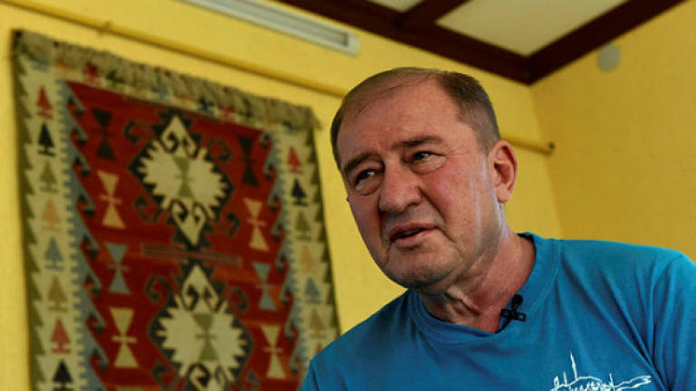 Russia hands Crimean Tatar leader 2-year sentence