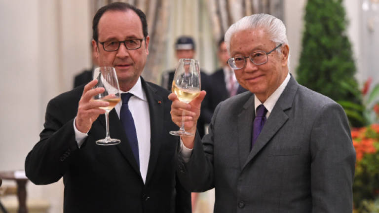 Hollande seeks to boost ties with Asia in face of 'isolationism'