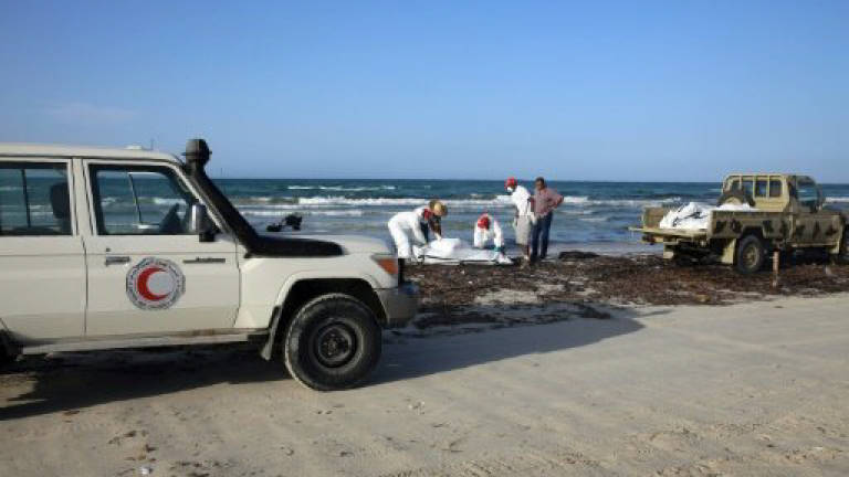 87 migrant bodies wash up on Libya beach