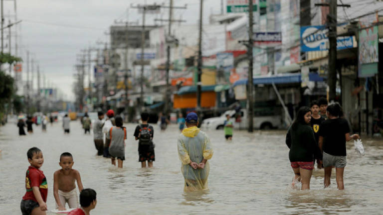 12 dead as torrential rains submerge Thai south