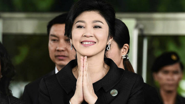 Thailand checks with Cambodia, Singapore on Yingluck's whereabouts