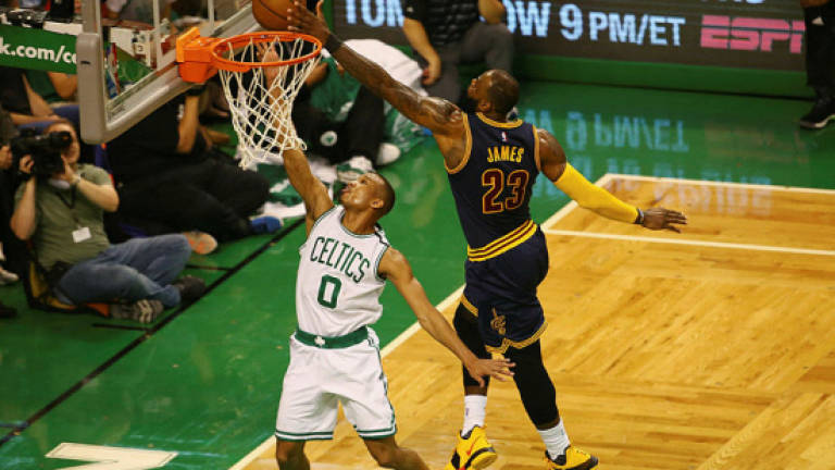 James powers Cavs in record rout of Celtics