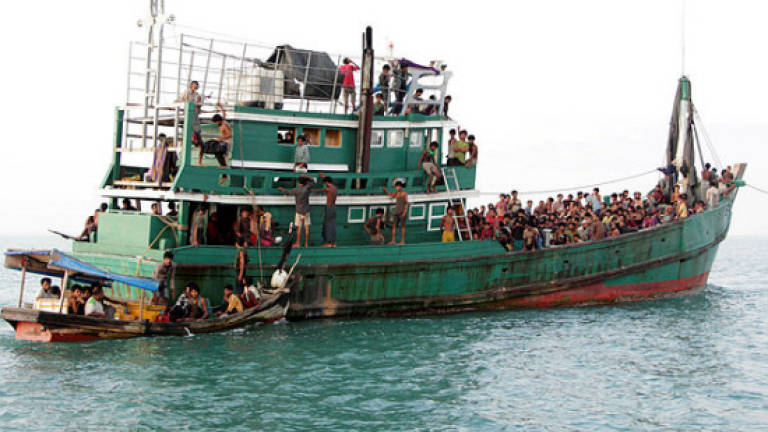 Boat carrying Rohingya stops on Thai island: Official