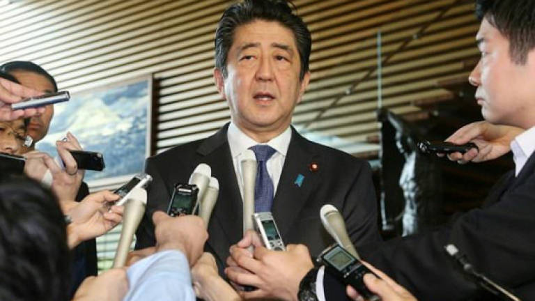 Japan PM under fire over shady dealings claims