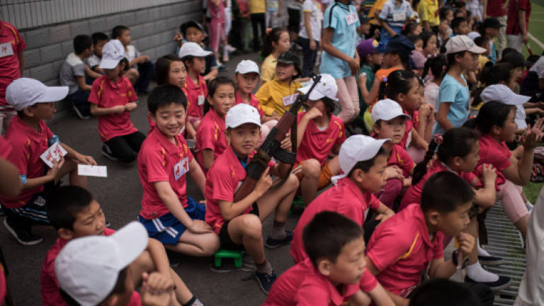 Lessons in loyalty as N.Korea celebrates children's day