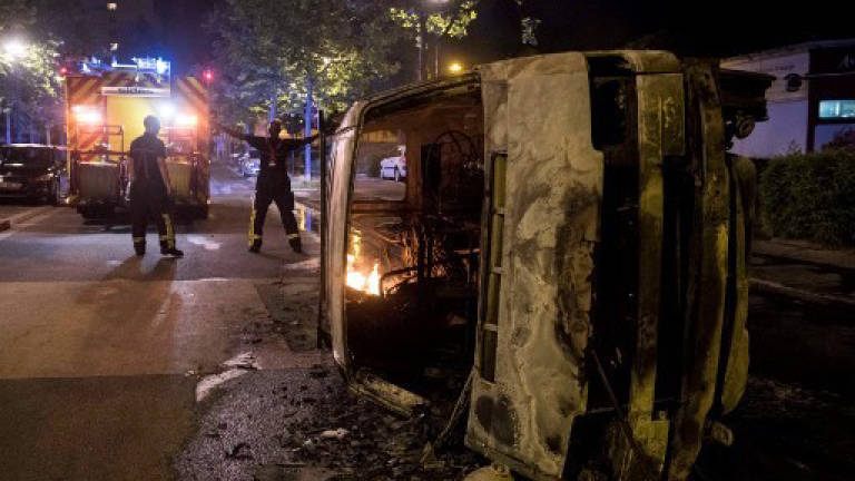 Clashes after French police shoot young man dead