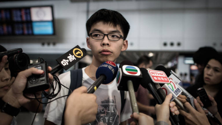 Hong Kong student leader Wong barred from Malaysia