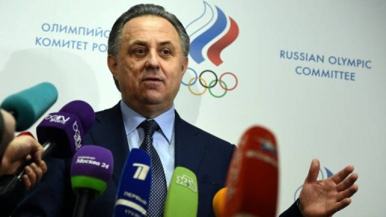 Russia vows to suspend officials named in doping report