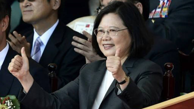 Taiwan leader says island secure ahead of China drills