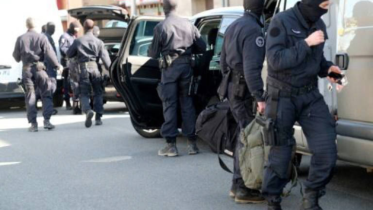 Hero French policeman fighting for life after jihadist shooting spree