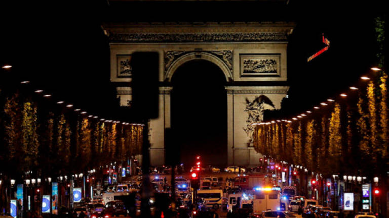 Champs Elysees shooting kills French police officer