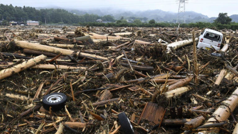 Huge floods sweep southern Japan, two dead, 20 missing (Updated)