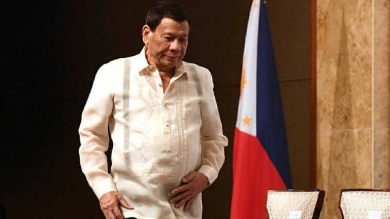 (Video) Philippines' Duterte defends kiss: 'We enjoyed it'