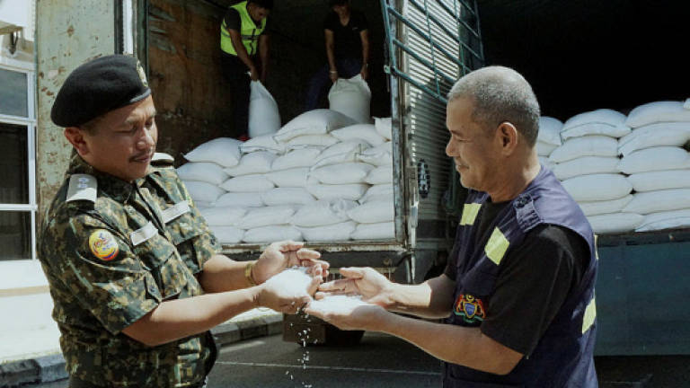 Aksem makes record seizures of glutinous rice in Kodiang this year