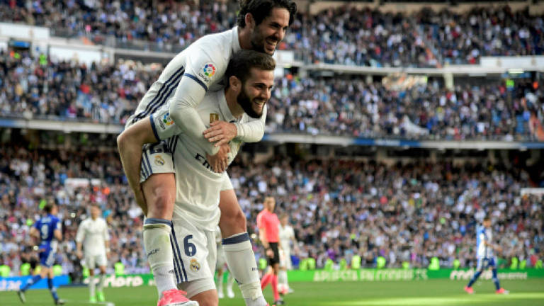 Madrid open up five-point lead over Barca