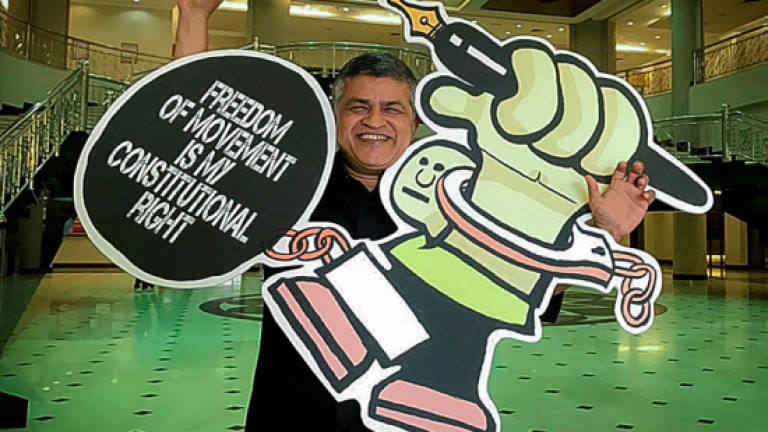 Cartoonist Zunar gets leave to challenge immigration order