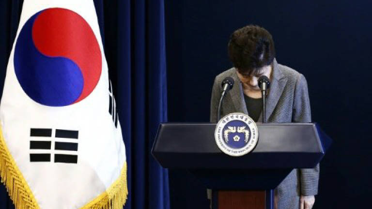 S. Korea ruling party splits over president's impeachment
