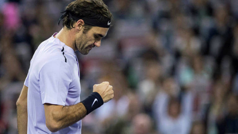 Federer shakes off 'scars' of Nadal defeats