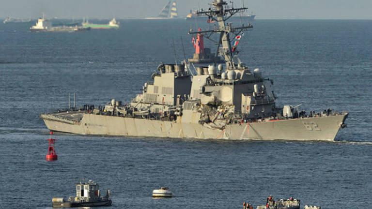 US Navy commanders face negligent homicide charges over collisions