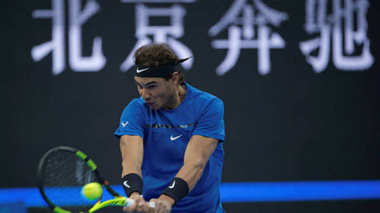'Very happy' Nadal survives Beijing scare