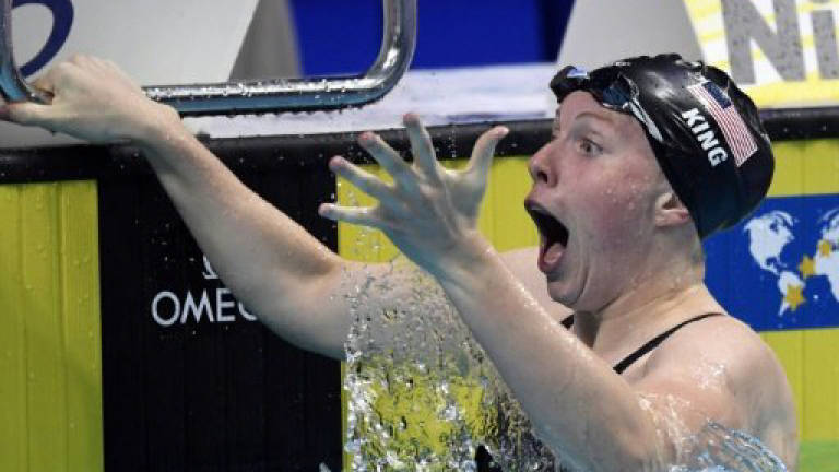 King breaks women's 100m breaststroke record