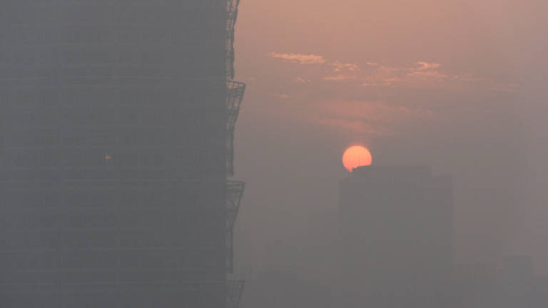 Smog returns, but Beijing says skies are getting cleaner