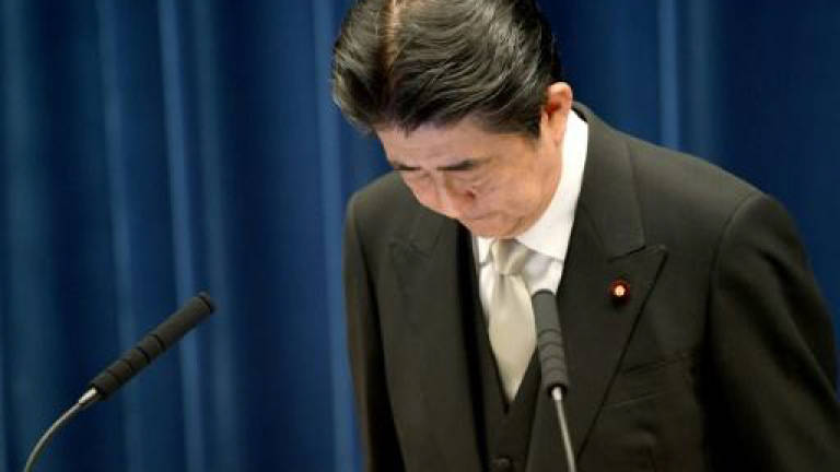 Even from 'hell hole', Japan's chastened Abe rules on
