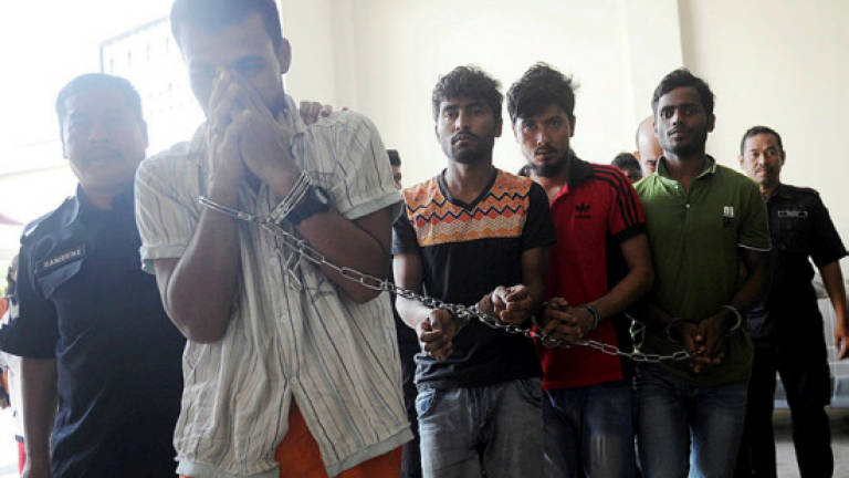 Five men charged with kidnapping nine foreigners