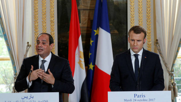 Macron stresses security, not rights, with Egyptian leader Sisi