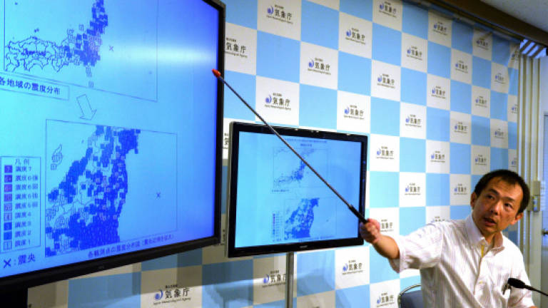 Japan braces for more aftershocks of giant 2011 quake