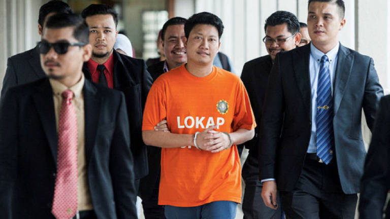 Ampang PKR youth chief claims trial to six charges under Anti-Money Laundering law