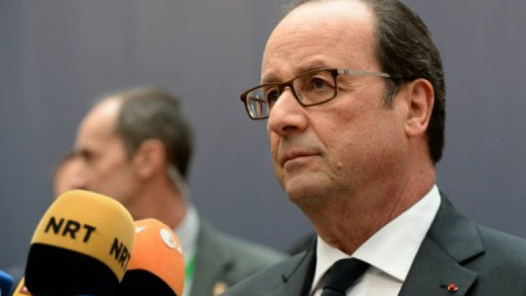France's Hollande warns UK's May of 'hard' Brexit talks