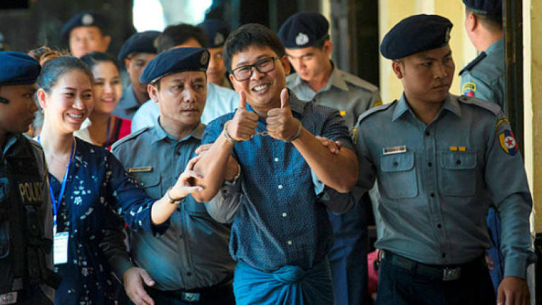 Myanmar court refuses to drop case against Reuters journalists
