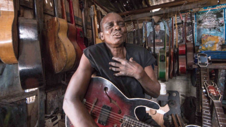 The guitar maker of Kinshasa: Father of a unique sound