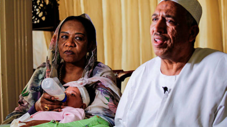 Bringing orphaned IS baby girl 'home' to Sudan