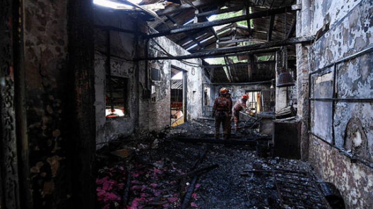 Suspect in Centipede Temple fire remanded for a week