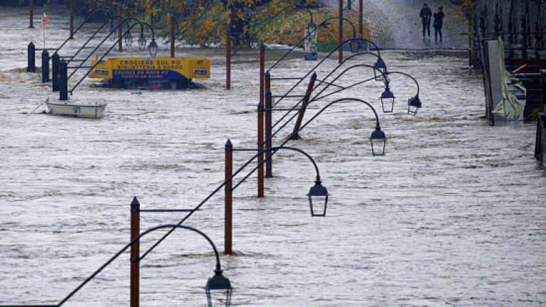 Italy floods wreak havoc, one feared dead