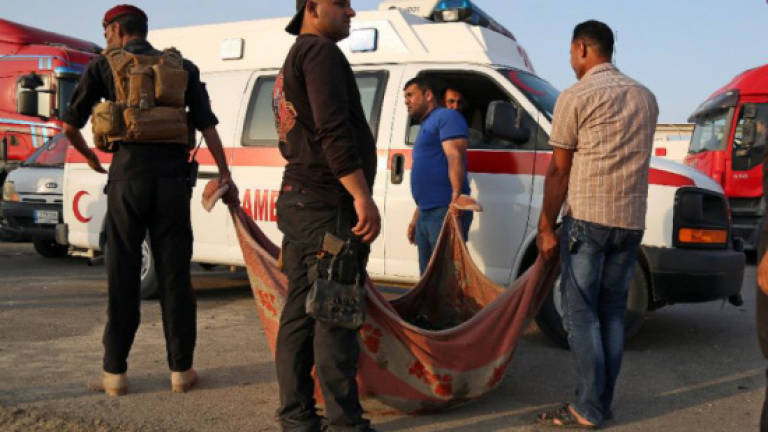 Dozens dead in Iraq attack claimed by IS
