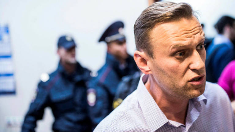 Russian court sentences Putin foe Navalny to 20 days in jail